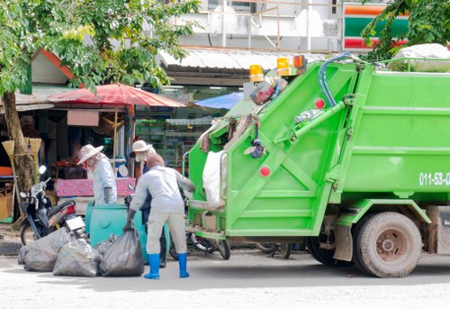 manager conducting an on-site inspection of waste collection